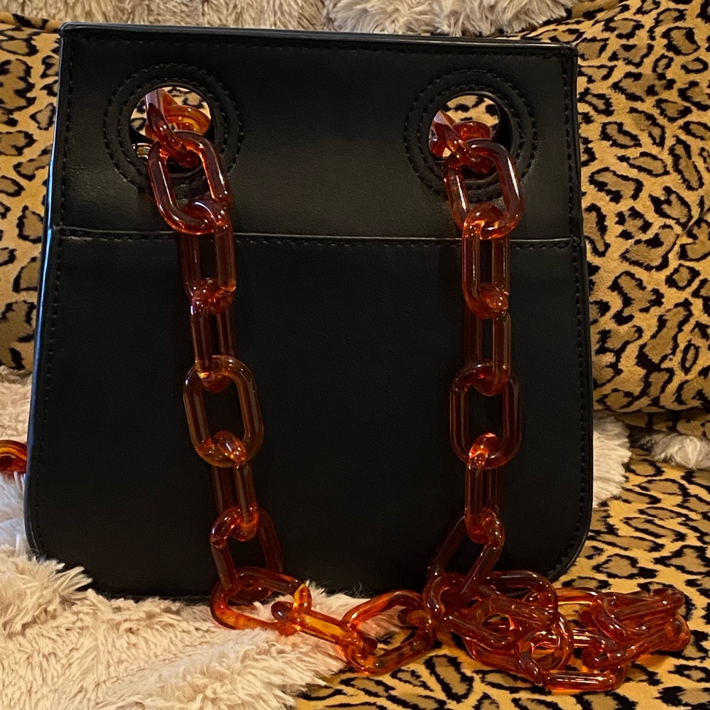 Super cute black small bag can be worn as Crossbody or shoulder bag like new